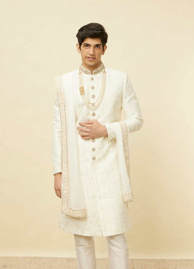 alt message - Manyavar Men Pearled Ivory White Bel Buti Patterned Sherwani Set image number 0